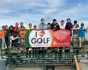 I Heart Golf kids standing on bleachers